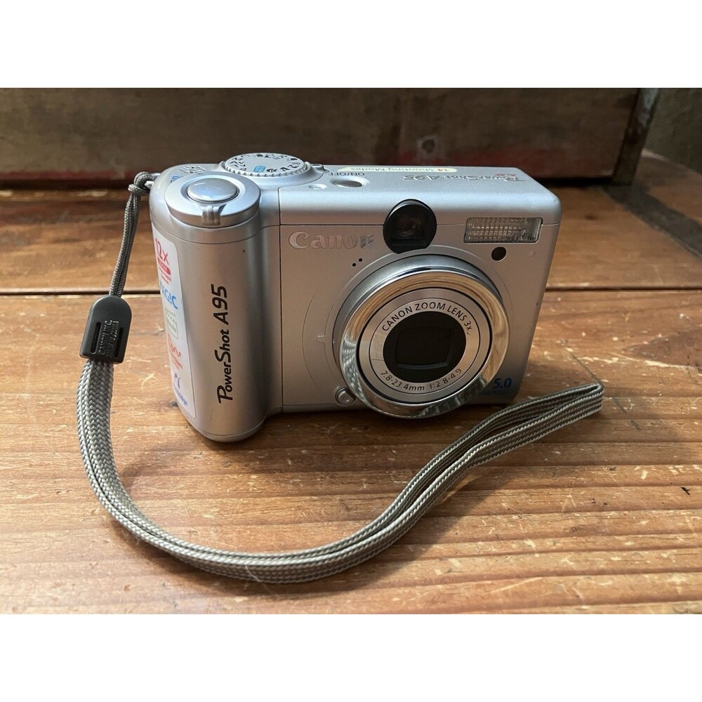 Canon Powershot A95 PC1099 Silver 2.5" LCD 5MP 12x Digital Camera POWERS ON
